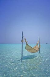 19A-18-C Overwater hammock, Anantara Resort, Maldives. © ADAMS / HANSEN STOCK PHOTOS