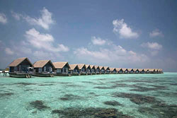 7339 All lodging at Cocoa Island is overwater. © ADAMS / HANSEN STOCK PHOTOS