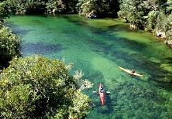 Kayakers, Falls River, Abel Tasman National Park.  &copy; ADAMS / HANSEN STOCK PHOTOS