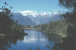 Mt. Cook and Mt. Tasman viewed from Lake Matheson.  &copy; ADAMS / HANSEN STOCK PHOTOS