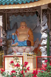 Buddha statue at temple in Dinh Quan, Vietnam. © ADAMS / HANSEN STOCK PHOTOS