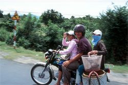 Family on motorbike. © ADAMS / HANSEN STOCK PHOTOS